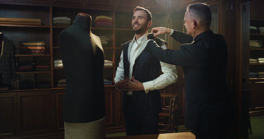 Cinematic, Shot,Of, Professional,Tailor, Taking,Measurements,Of,Client to show as mens suits dubai