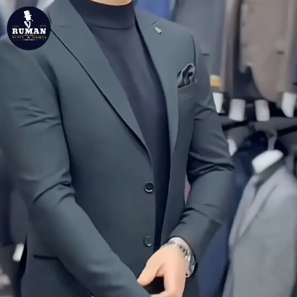 A man confidently wearing a lightweight, tailored suit, demonstrating how to dress sharp in Dubai’s weather.