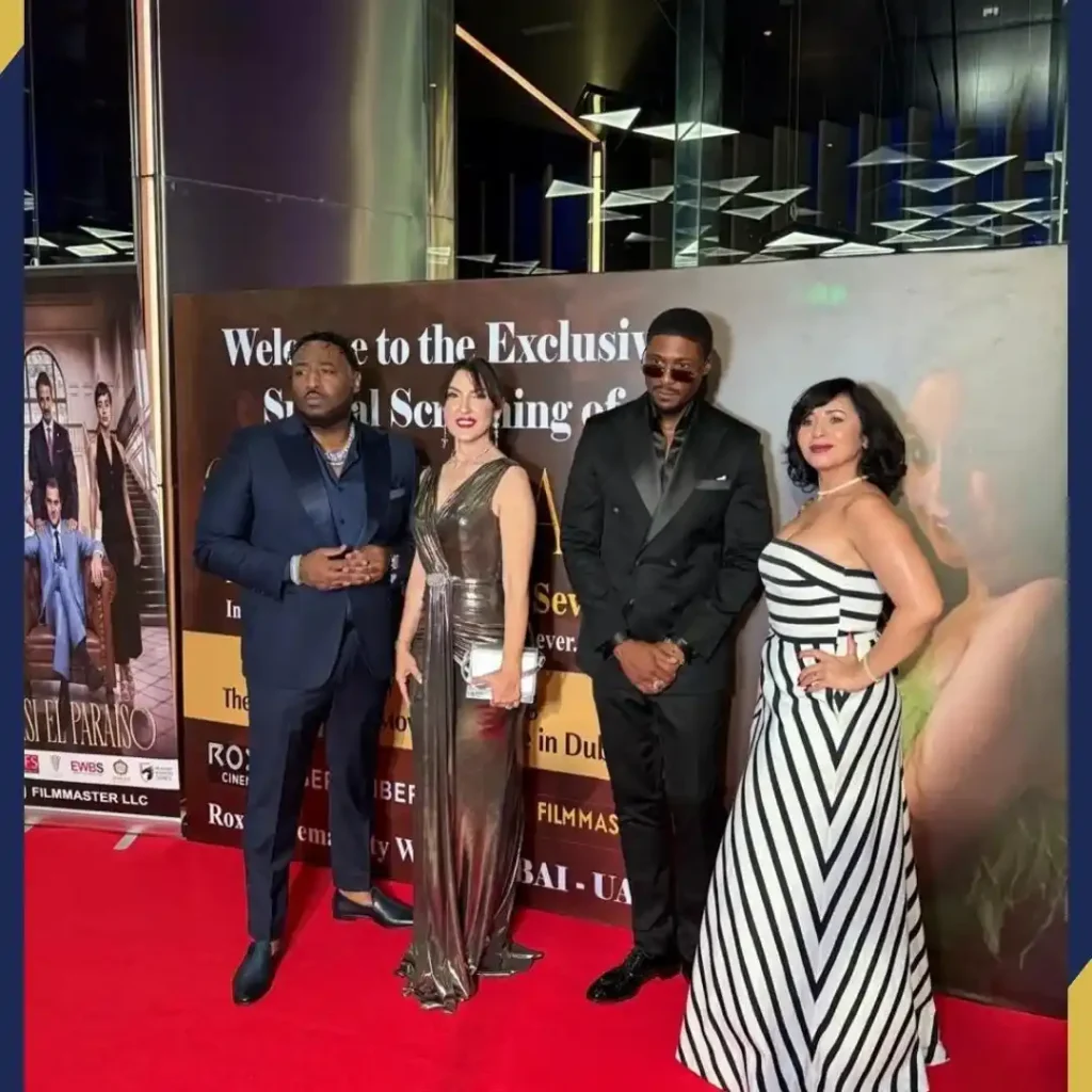 A professional tailor measuring fabric and stitching details, representing the process behind how to dress like a celebrity.