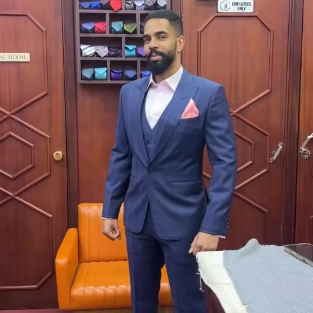 A collection of ties, watches, belts, and shoes illustrating the Guide to Matching Accessories With Suits.