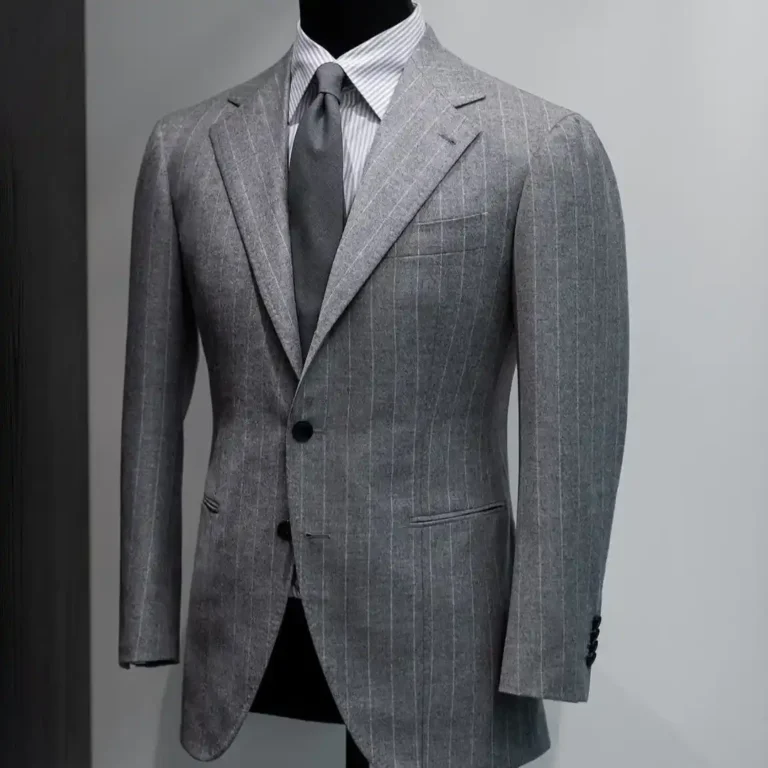 Custom tailored suit showcasing premium craftsmanship, highlighting custom suit costs in Dubai for men seeking perfect fit and luxury styling.