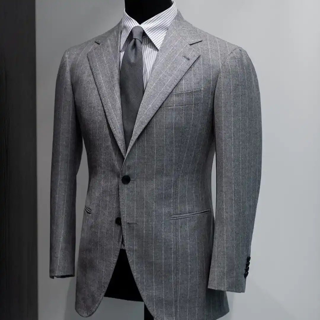 Custom tailored suit showcasing premium craftsmanship, highlighting custom suit costs in Dubai for men seeking perfect fit and luxury styling.