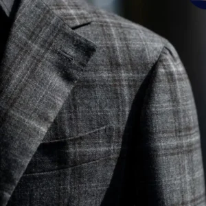 Common Fit Issues That Ruin Expensive Suit including poor shoulder fit, sleeve length errors, and incorrect trouser break