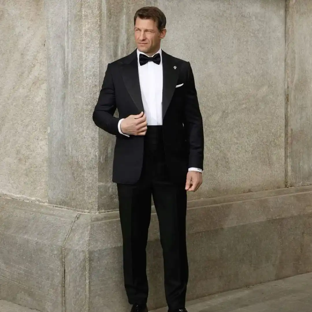 How to Choose the Perfect Custom Tuxedo featuring a perfectly tailored black tuxedo designed for formal events, showcasing premium craftsmanship, elegant fit, and luxury menswear styling.