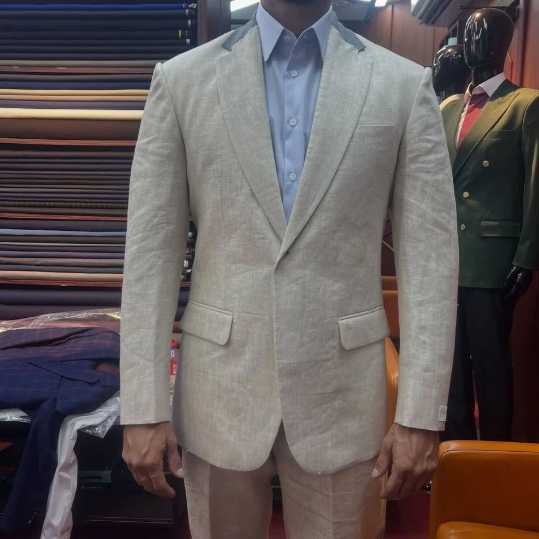 Luxury Mens Tailor Dubai Services featuring a perfectly tailored bespoke suit crafted with premium fabrics, precise measurements, and expert craftsmanship for every occasion.
