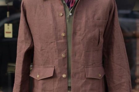 Stylish man wearing the Best Lightweight Suits for Hot Weather, perfect for summer with breathable fabric and a comfortable fit.