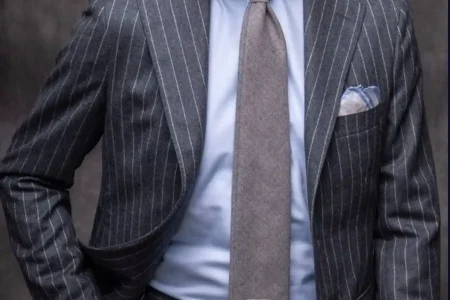 A stylish man wearing a perfectly tailored suit, demonstrating the Guide to Elevating Men’s Fashion in Dubai.